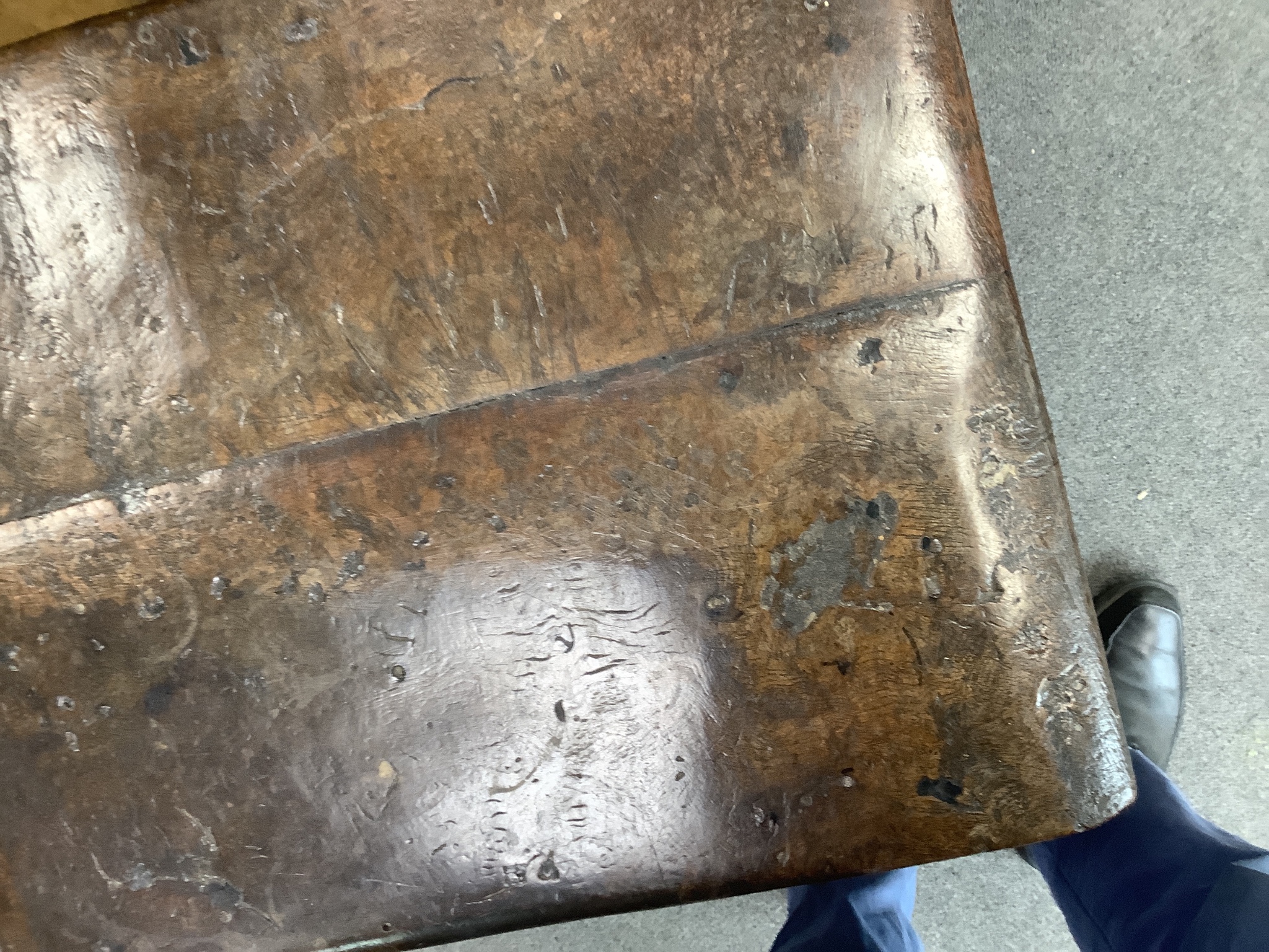 A 17th century rectangular oak small table with twin planked top, width 62cm, depth 52cm, height 61cm